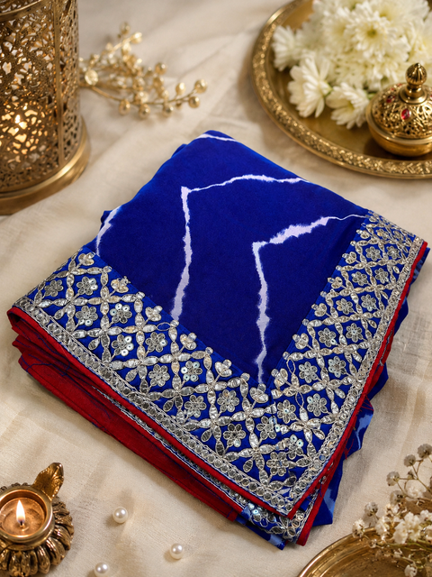 Soft georgette based lehariya print sarees with gotta patti and sequined work border. Blouse Worn By The Model Is For Reference Purposes Only. The Blouse Piece Is Attached Separately With The Saree. Slight Variation In Color And Design May occur