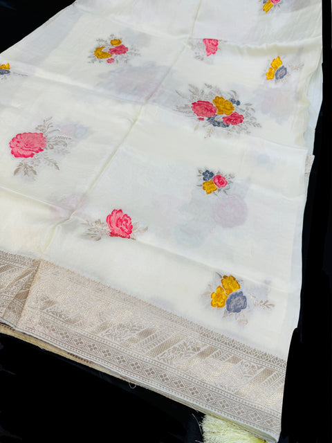Cream color Pure and very soft brocade floral work silk saree