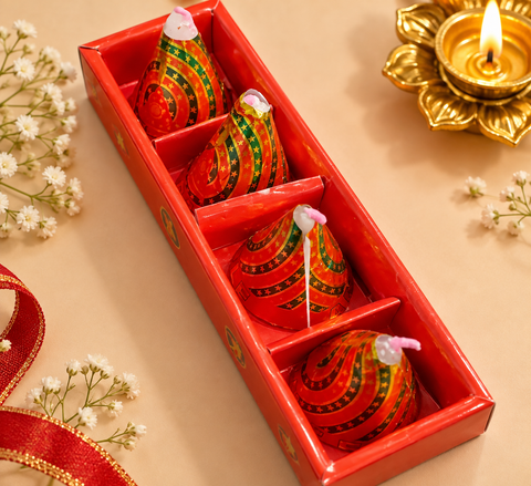 Colourful Anar-Shaped Candle Set with 4 decorative candles in a tray, perfect for Diwali décor and gifting. Slight variation in shape, finish or overall appearance may occur due to the handmade wax design and transit.
