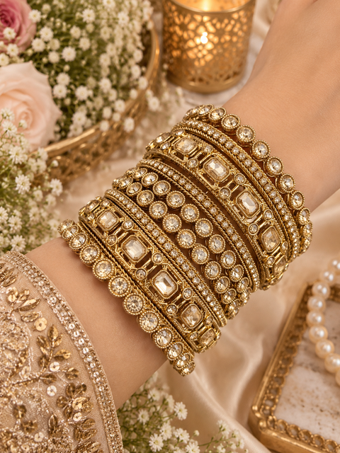 Beautiful bangle set featuring sparkling polki stones (Slight variations in color & design is possible )