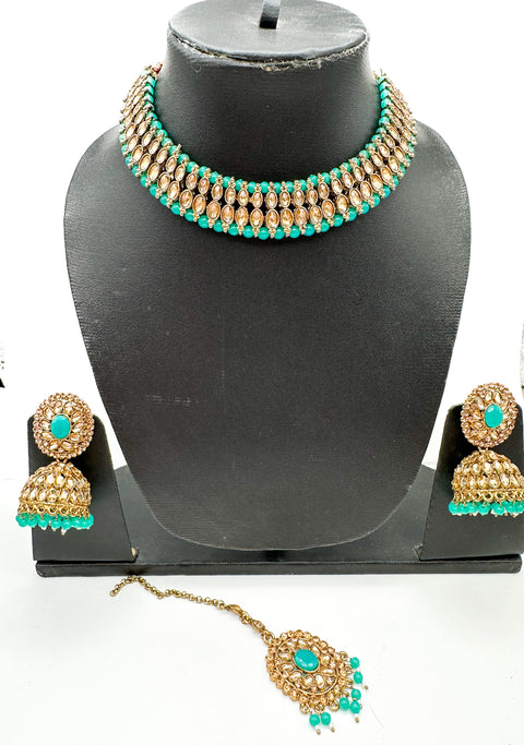 Golden stone with pearls studded simple Necklace with beautiful Jhumka & Tikka set
