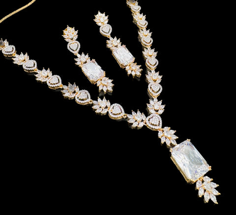 Golden  American Diamond beautiful necklace set with crystal American diamonds