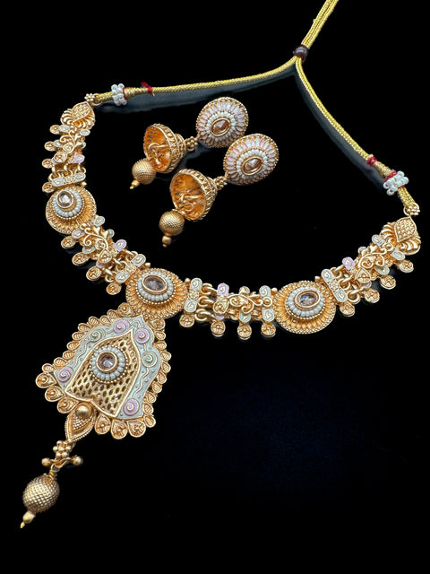 Mat look antique gold traditional necklace set with pearls and kundan work