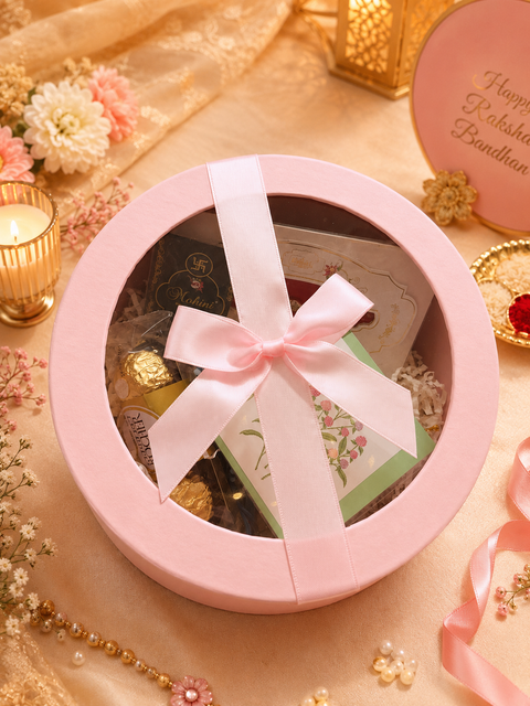 Customisable Rakhi Gift Box – Create a thoughtful Raksha Bandhan surprise with our beautifully curated custom gift box. It includes a Rakhi, Rakhi thread, premium chocolates, dry fruits, a tilak pack & a heartfelt greeting card for your personal message