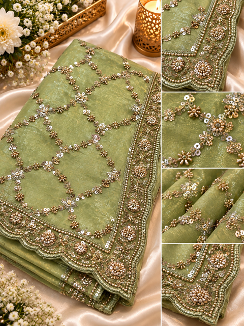 Fendi Silk Saree featuring all-over intricate handwork,sequin detailing and a heavily embellished scalloped border for a rich festive look. Attached blouse piece included; model blouse is for reference only. Slight variation in colour and design may occur