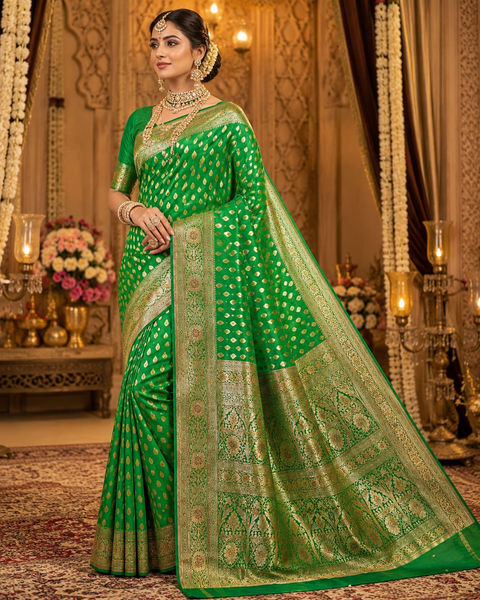 Luxurious Banarasi Silk Saree with rich zari weaving and elegant stone work on the pallu. Comes with an attached blouse piece. Model image is for reference only; slight variation in color and design may occur.