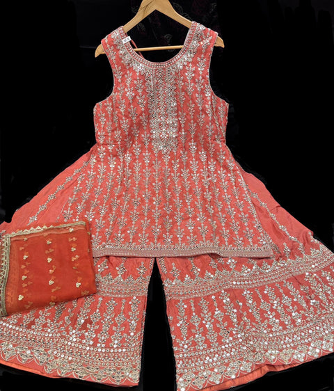 Georgette based sequined and embroidery work kameez with sharara pants and netting dupatta