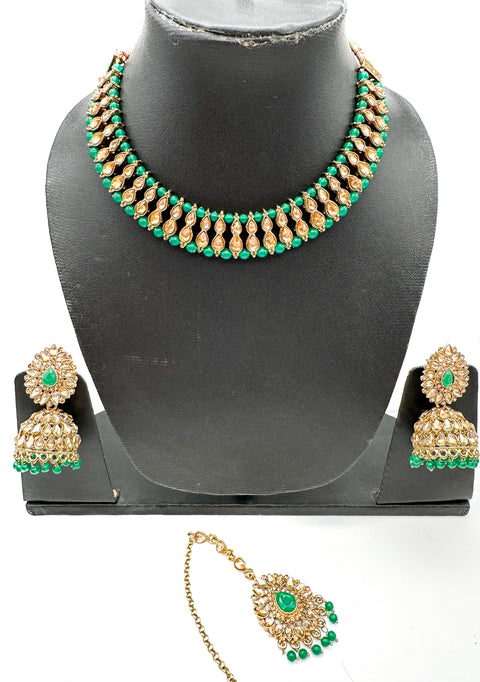 Golden stone with pearls studded simple Necklace with beautiful Jhumka & Tikka set