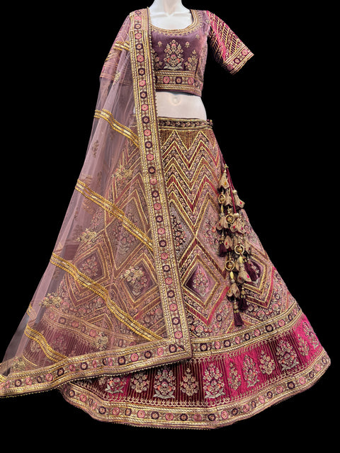 (Video clip attached)size42(upto 46)Pastel Purple mauve shade velvet based heavy embroidery & gotta patti work with golden stone & maroon with pink Mint colour flower design very heavy super big flared heavy ken designer Bridal Lehnga with bigger tessels