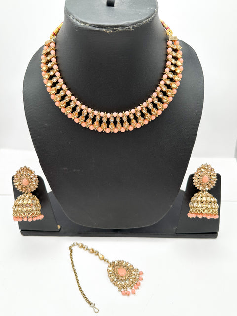 Golden stone with pearls studded simple Necklace with beautiful Jhumka & Tikka set