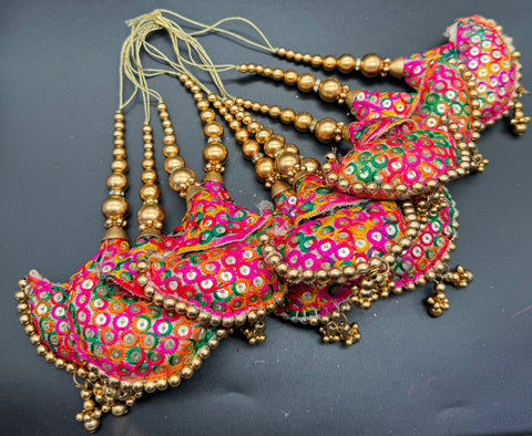 Beautiful cushioned design medium size lehnga latkans tessels (pair)