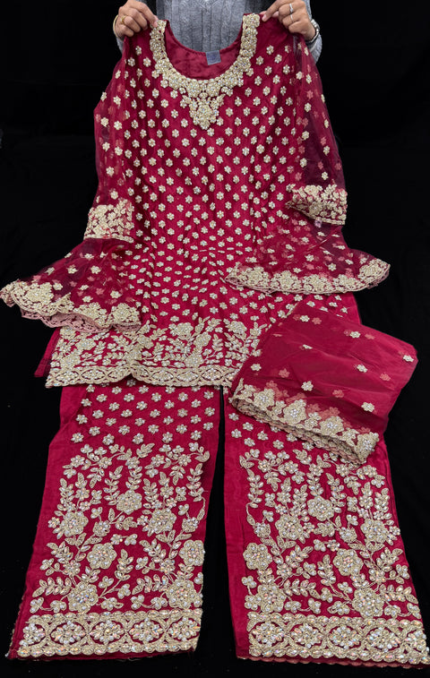 Cherry color Netting based Golden stones and embroidery work all over front & back of kameez with stone work and beautiful plazo pants with Long heavy work jacket& netting dupatta (Size 42 and can be altered upto 44)