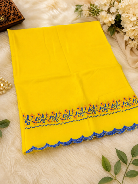 Elegant Hazoori Saropa crafted in rich yellow fabric, adorned with traditional white and yellow embroidery and a delicate scalloped border.Size (around 216cms lenth / 84 cms wide)