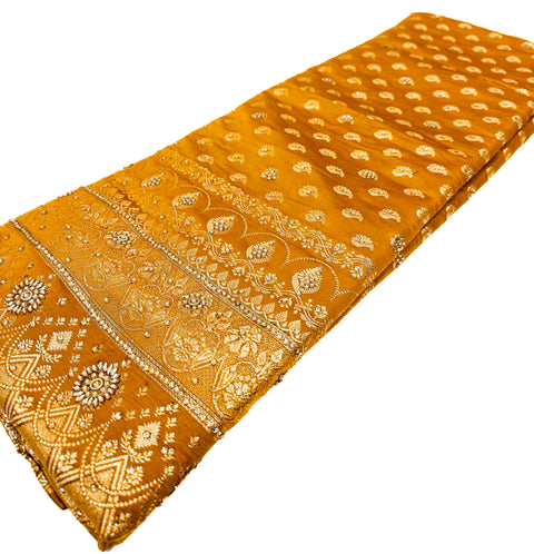 Beautifully designed Banarasi Silk Saree with heavy Handwork with stones & Zari