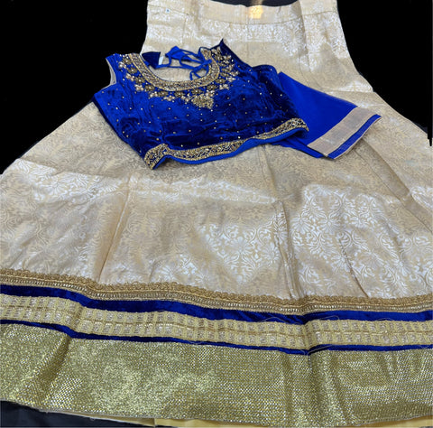 Royal blue  colour velvet based stone work blouse with brocade silk lehnga