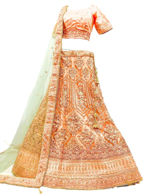 Size 40(UPTO 44)Pastel peach colour Netting Based Beautiful Heavy Embroidered & sequined with stone Work Heavy Ken Ken Big Flare Stitched Lehnga & Blouse With Attached Tessels & Heavy Lace Border Beaded Work Dupatta