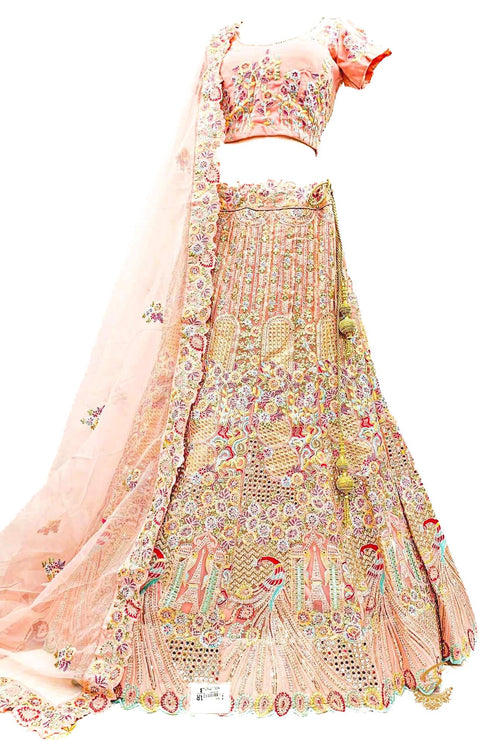 Size 42(UPTO 46)Pastel peach colour Netting Based Beautiful Heavy Embroidered peacock design & sequined with stone Work Heavy Ken Ken Big Flare Stitched Lehnga & Blouse With Attached Tessels & Heavy Lace Border Beaded Work Dupatta