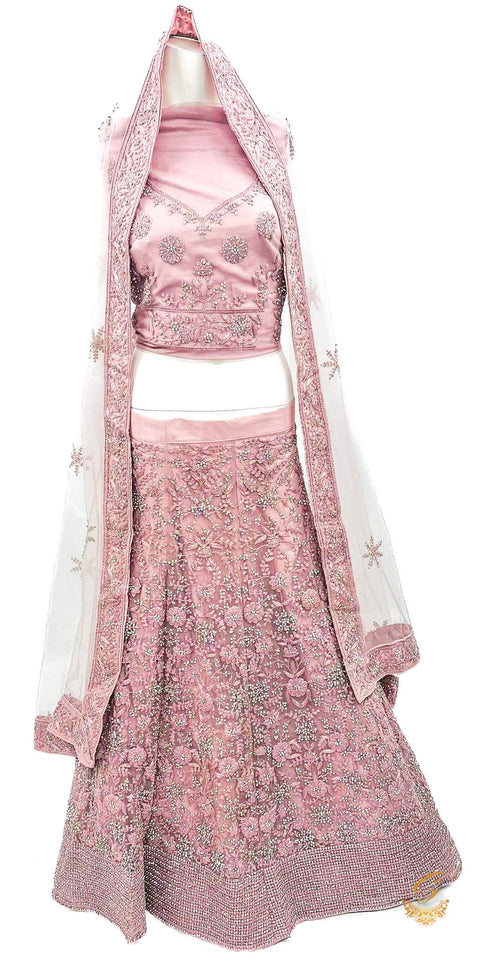 Pastel Kobi Pink colour netting based heavy embroidery work`with silver stone work multiflared beautiful bridal lehnga