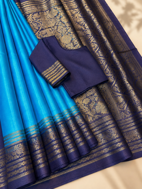 Plain Silk Saree With Contrast Zari Border And Contrast Plain Blouse, Model-Worn Blouse Is For Reference Only. Unstitched Blouse Piece Is Attached With Saree(Slight Variation In Color & Design Is Possible)