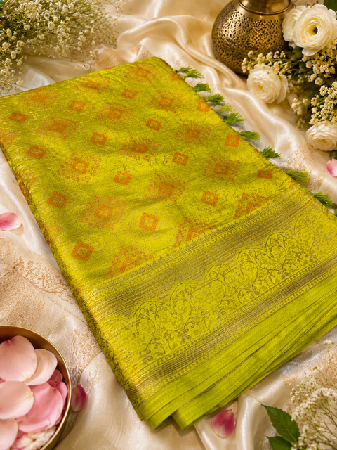 Elegant Soft Silk Blend Saree featuring intricate all-over woven motifs and a rich zari border. The lightweight fabric offers a graceful fall and comfortable drape, Blouse piece is attached with the saree. Slight variation in color and design may occur.