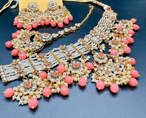 Kundan with pearls work beautiful heavy work necklace with designer Jhumka Earrings and Tikka