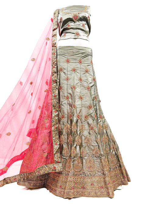 Silk based embroidery work with stone work lehnga & netting dupatta