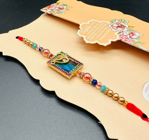 Beautiful Peacock feather studded in stone work Rakhi on Greeting Card