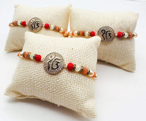 Beautiful Stone Studded Rakhi In Beautiful cushioned Packing