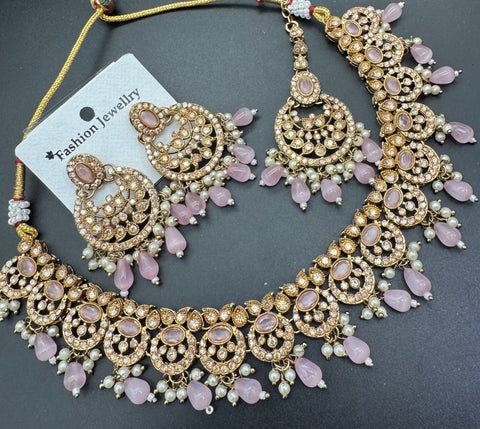 Pastel pink Beautiful stones and pearls work necklace set with beautiful earrings & Tikka
