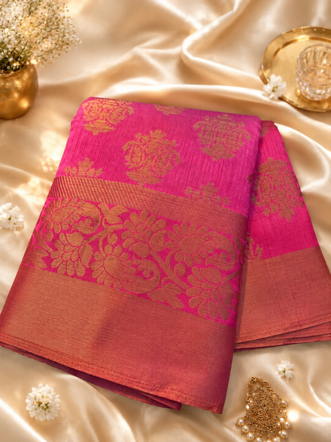 Graceful Cotton Silk Saree featuring elegant zari weaving, a rich texture, and a structured drape . Attached Blouse Piece Included. Slight Variation In Colour And Design May Occur.