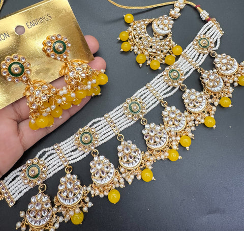 Kundan stone with pearls beaded choker set with beautiful earrings & tikka