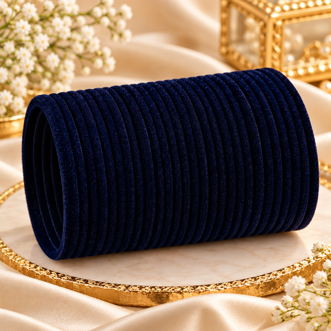 Elegant velvet bangles in a rich Dark Navy Blue shade, perfect for festive, bridal and traditional looks. Each pack includes 3 dozen bangles (36 pieces). Price is per pack. Slight variation in colour may be possible