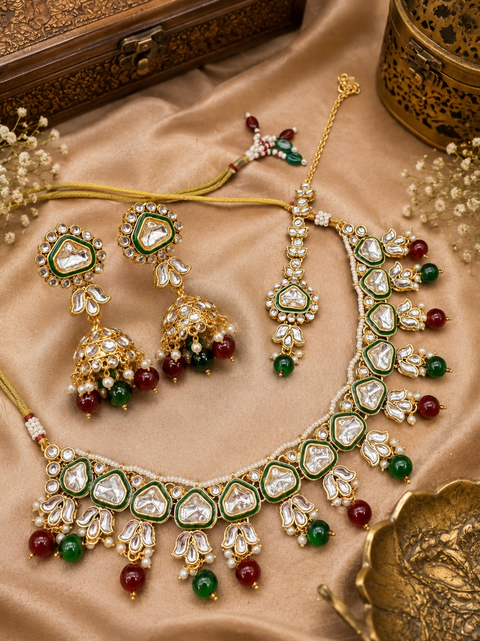 Beautiful bigger Kundan and pearls work classy necklace set with beautiful earrings & Tikka