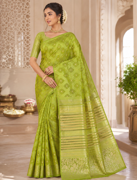 Art silk saree,woven pallu and intricate border.Comes with attached blouse piece (model blouse for reference only)Slight color in color and design may be possible)