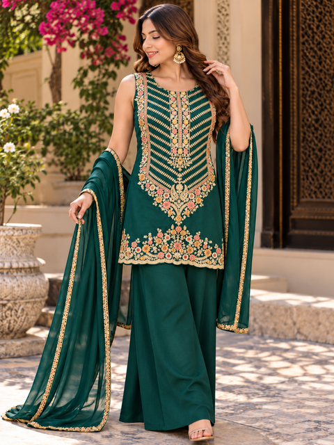 Beautiful georgette fabric outfit with full embroidery work all over the kameez. Paired with a loose circular palazzo and a matching dupatta with just a border. 
Slight variation in colour and design is possible