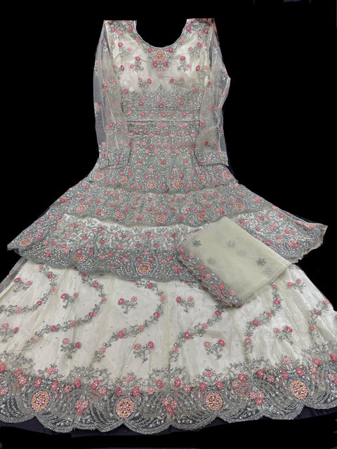 Netting based Golden stones and embroidery work all over front & back of kameez with stone work and beautiful lehnga & netting dupatta (Size 42 and can be altered upto 44)