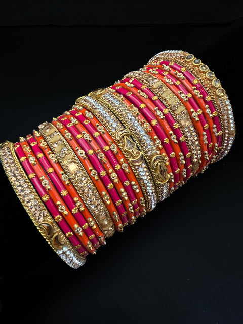 Hot Pink & Orange Glass bangles with golden brass bangles set with latkan kade set(displayed picture is for both hands set) price is for whole set displayed in picture)