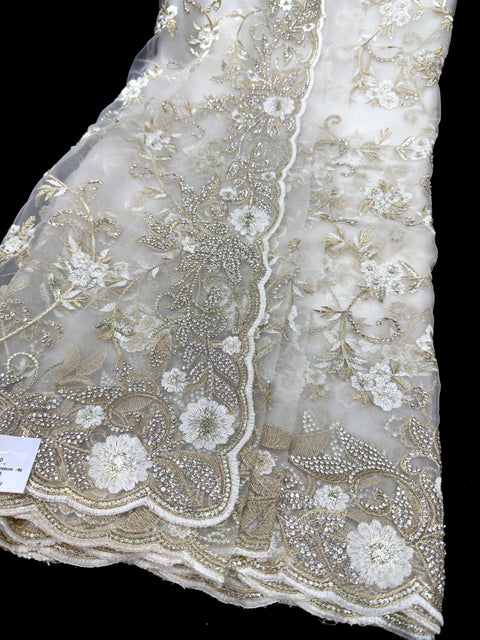 (Video Clip attached )White color Heavy work designer Saree with netting base fabric and stones work design all over with heavy embroidery work