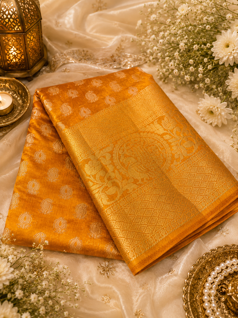 Premium soft Silk Saree with rich zari weaving and contrast woven pallu. featuring elegant dual-tone shades.Model-worn blouse is for reference only. Unstitched blouse piece is attached with saree(slight variation in color & design is possible)