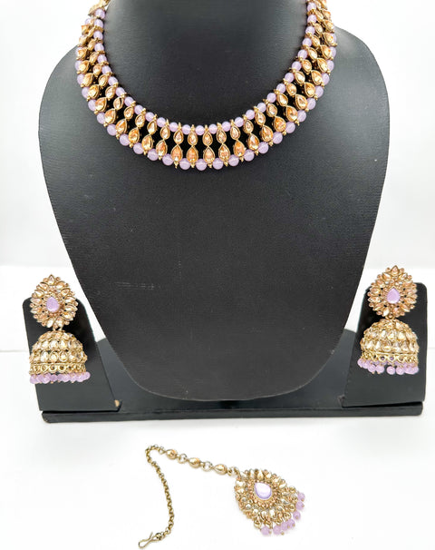 Golden stone with pearls studded simple Necklace with beautiful Jhumka & Tikka set