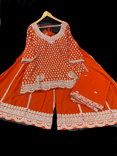 (Video clip attached) Rust Orange color georgette based embroidery with stone work with big flared embroidery work plazo and embroideryh work georgette dupatta (size 48 and can be altered upto 50)