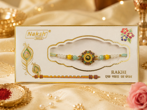 Elegant handcrafted Rakhi with premium beads and sparkling stonework, beautifully crafted to celebrate the special bond of love and protection.