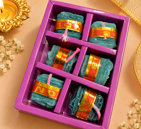 Colourful Firecracker-Inspired Candle Set with 6 decorative candles, perfect for Diwali décor and gifting. Slight variation in shape or finish may occur.
