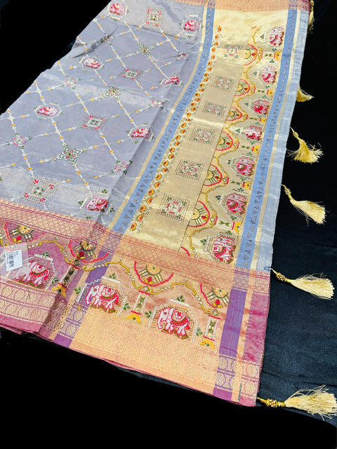 (Video clip attached ) Soft tissue silk embroidery saree with stone work and tessels attach on Pallu