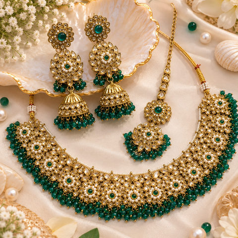 Beautifully crafted with sparkling golden stones, Polki-look stones, and colourful beads. Slight variations in colour and design are possible.