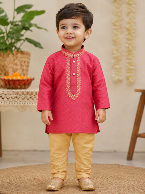 Kids Pink Kurta Pajama Set – Comfortable festive wear with golden pajama, perfect for weddings and celebrations. Slight color and design variation may be possible.