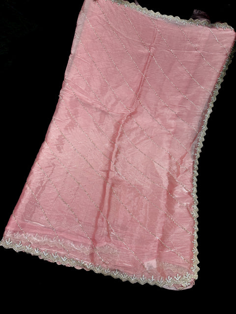 Pastel shades Jimmy Choo base fabric With Beautiful handwork all over on Saree and border