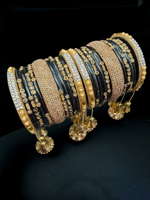 Black & Gold Glass bangles with golden brass bangles set with latkan kade set(displayed picture is for both hands set) price is for whole set displayed in picture)