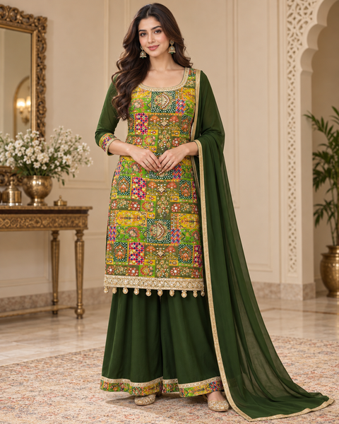 Silk-blend patchwork kameez with mirror & stone work, paired with a flowy circular palazzo and plain georgette dupatta with golden border. Slight variation in colour/design possible