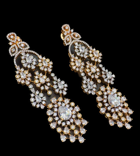(video clip attached )Golden color Beautiful and elegant look Bridal/Semi Bridal American diamonds studded Heavy work necklace with beautiful earrings Note :- original AD stones  not fake plastic stones )